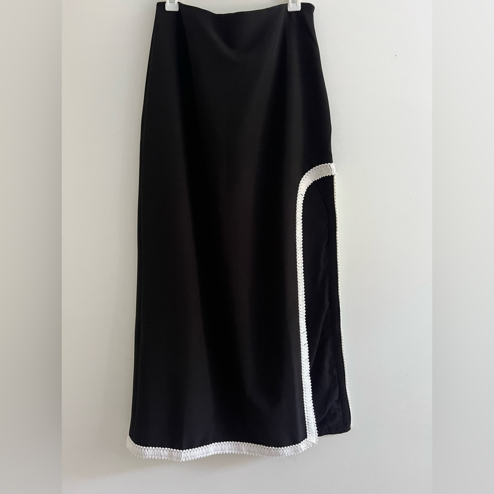 Elegant Black Skirt with White Trim